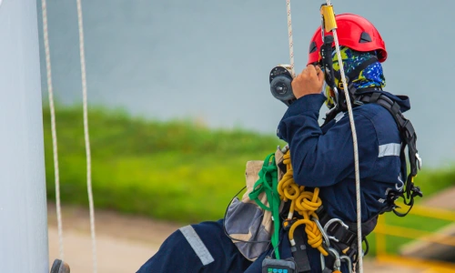 Industrial safety professional performing specialized training for Work at Height and rescue operations